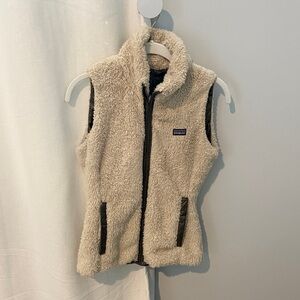 Patagonia Women’s Reversible Cream Vest with Brown Accents.